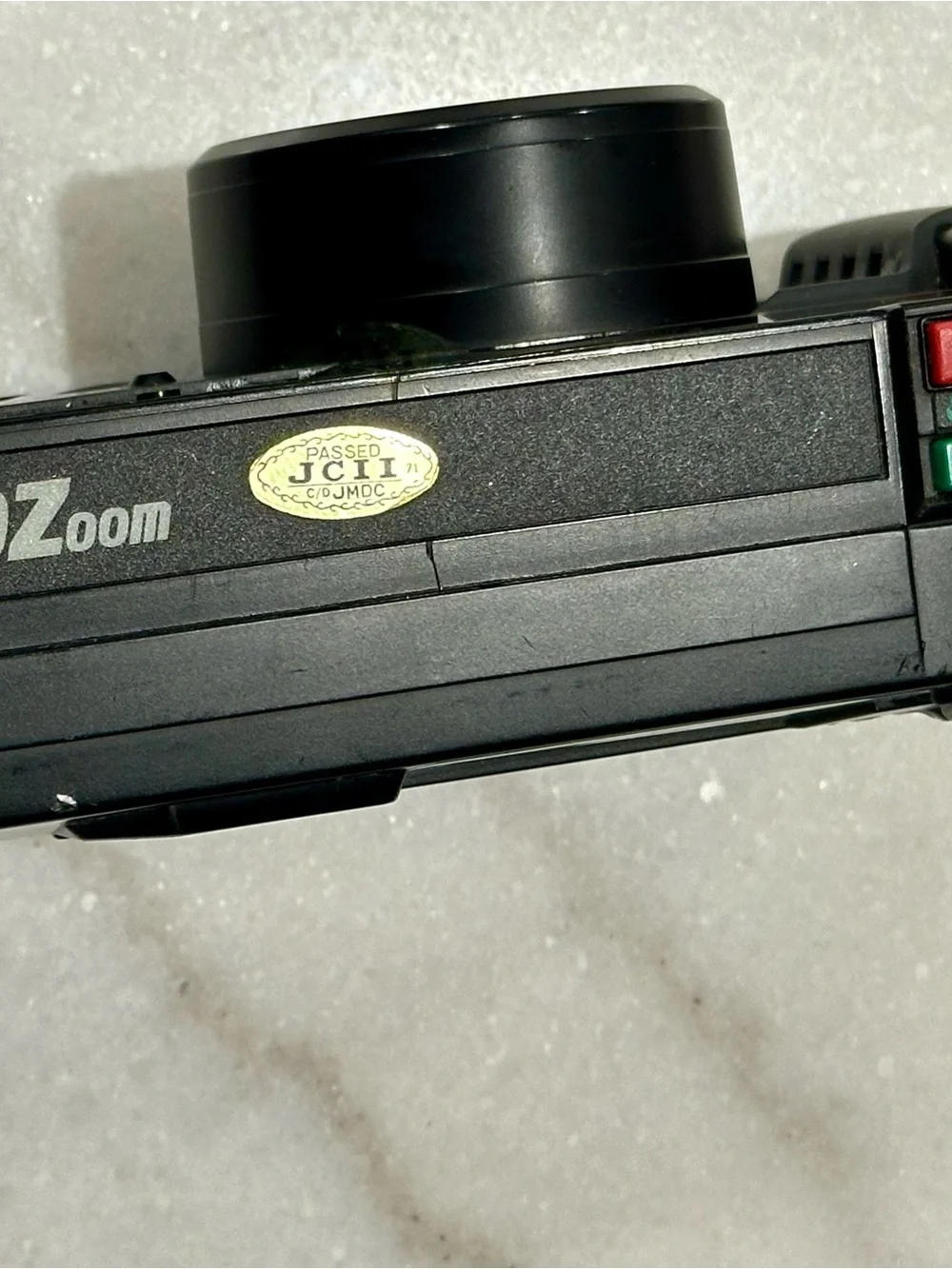 Pentax Black Point-and-Shoot Film Camera with Red-Trim Strap